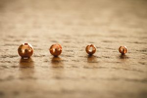 Copper slotted tungsten beads